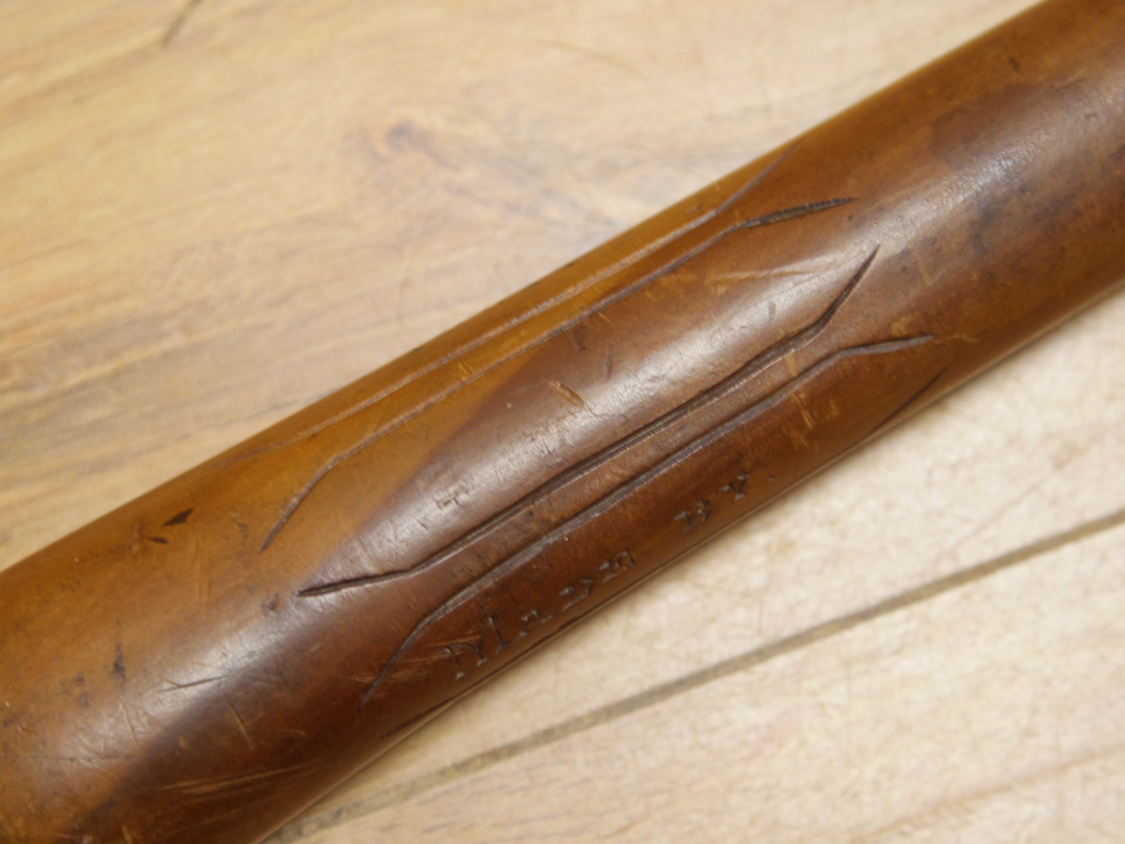 A carved lignum vitae prisoner of war walking stick/fid inscribed, ‘St Helena, 1901, made by, POW’, 90cm in length. Condition - fair to good